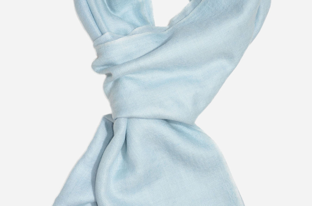 Beautifully light and scrumptiously soft "Baby Blue" Cashmere Scarf is hand woven from the highest grade of 100% pure Cashmere from Kashmir.