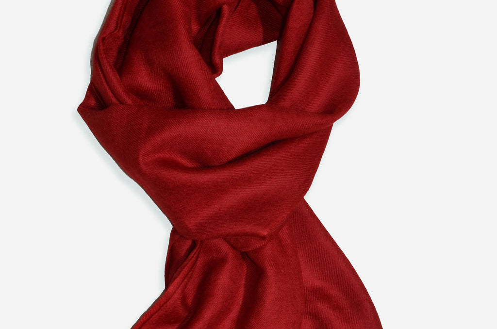 Beautifully light and scrumptiously soft "Wine" Cashmere Scarf is hand woven from the highest grade of 100% pure Cashmere from Kashmir.
