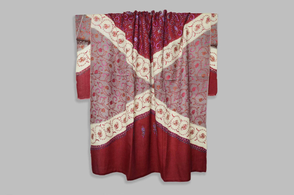 The best wool shawls to keep you warm. This triple dye shawl gives a royal look on you and has an amazing hand embroidery