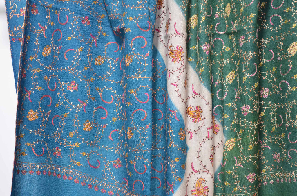 The best wool shawls to keep you warm. This triple dye shawl gives a royal look on you and has an amazing hand embroidery