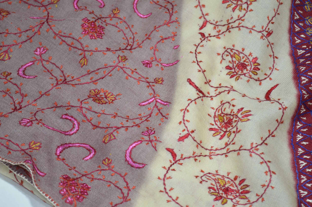 The best wool shawls to keep you warm. This triple dye shawl gives a royal look on you and has an amazing hand embroidery