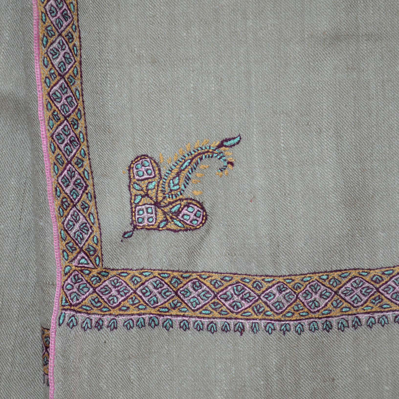 Pashmina embroidery on the border of this over sized shawl