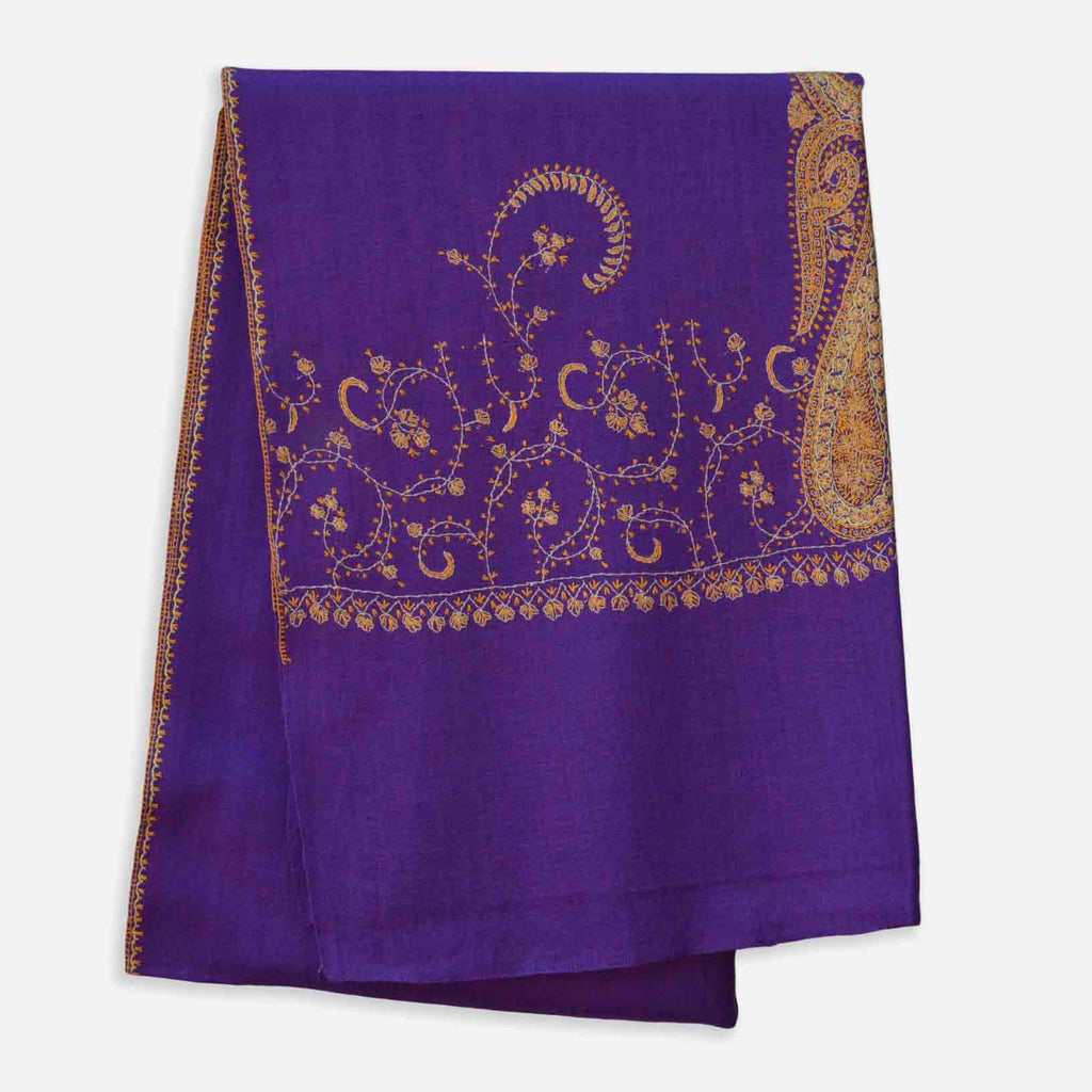 Big border embroidery on this violet woolen stole
