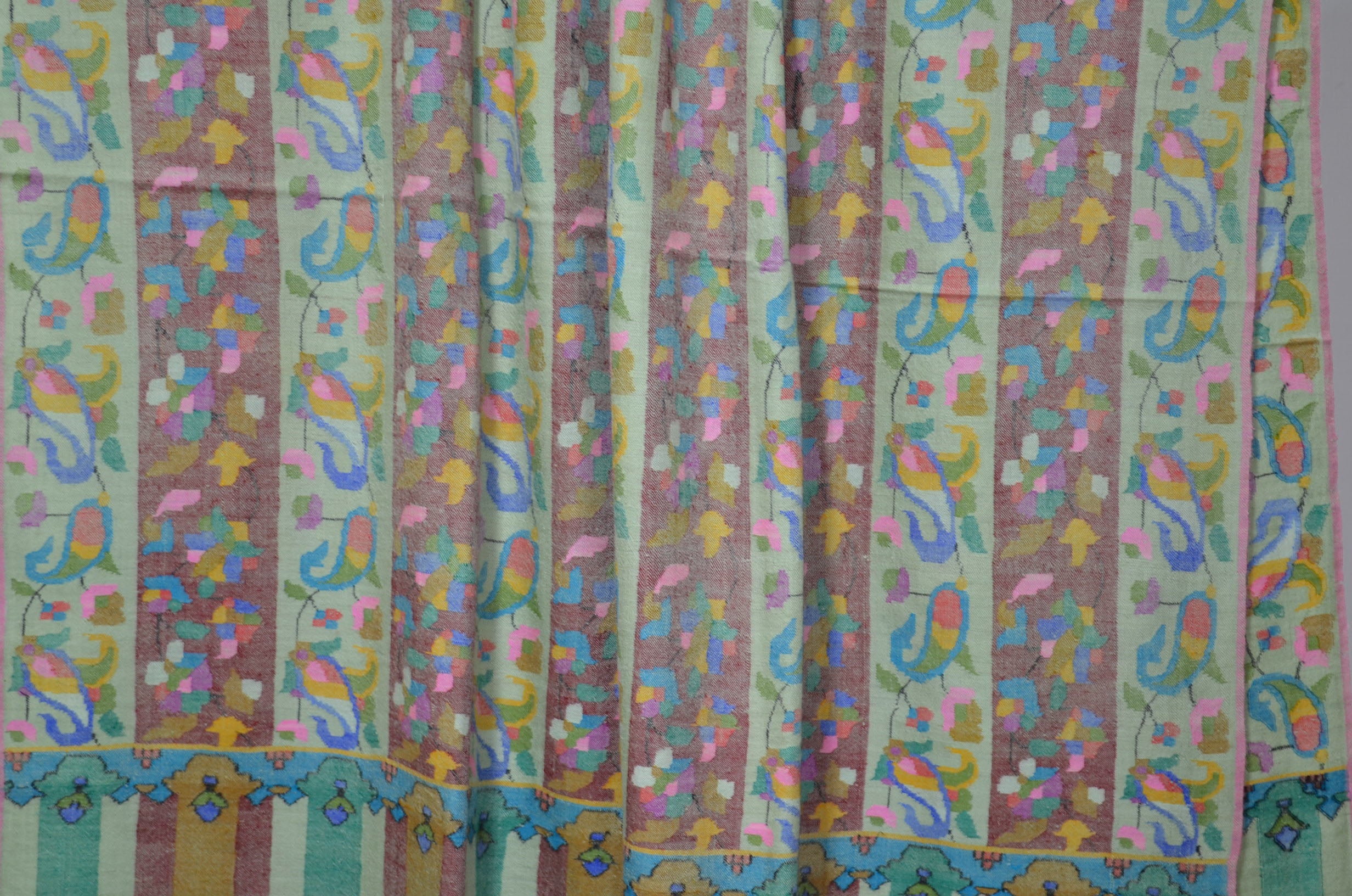 A luxurious Cashmere Pashmina jamawar kani shawl made from highest quality fibers. This kani shawl is a signature of royality. Buy and feel the softness and warmth of this pashmina kani shawl. Hand embroidered in Kashmir | purekashmir.com