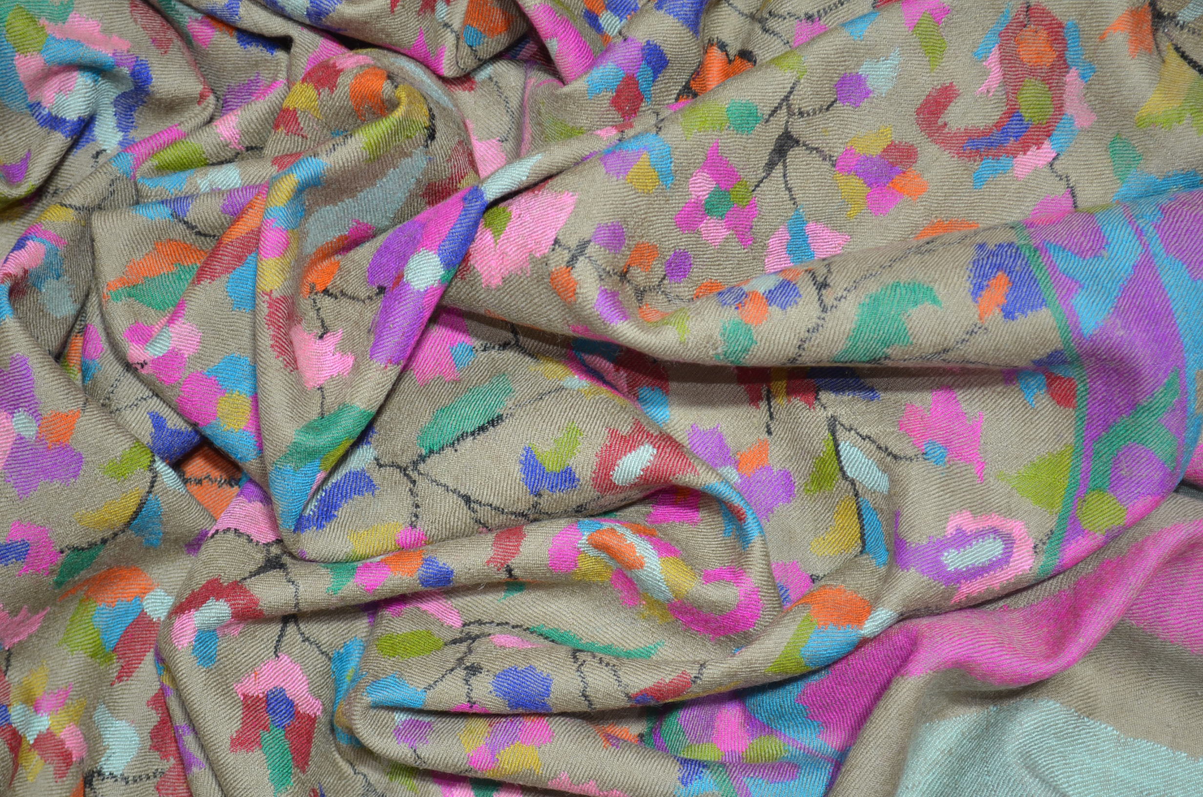 A luxurious Cashmere Pashmina jamawar kani shawl made from highest quality fibers. This kani shawl is a signature of royality. Buy and feel the softness and warmth of this pashmina kani shawl. Hand embroidered in Kashmir | purekashmir.com