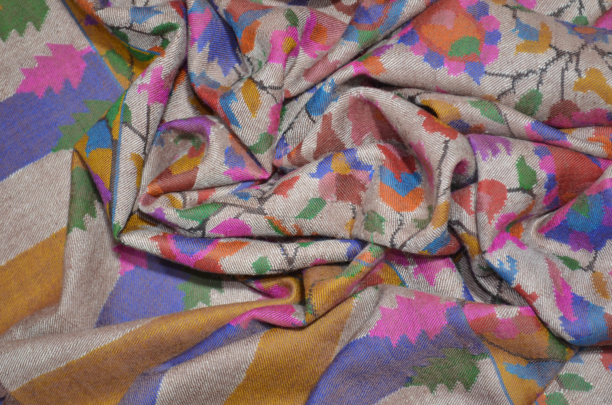 A luxurious Cashmere Pashmina jamawar kani shawl made from highest quality fibers. This kani shawl is a signature of royality. Buy and feel the softness and warmth of this pashmina kani shawl. Hand embroidered in Kashmir | purekashmir.com