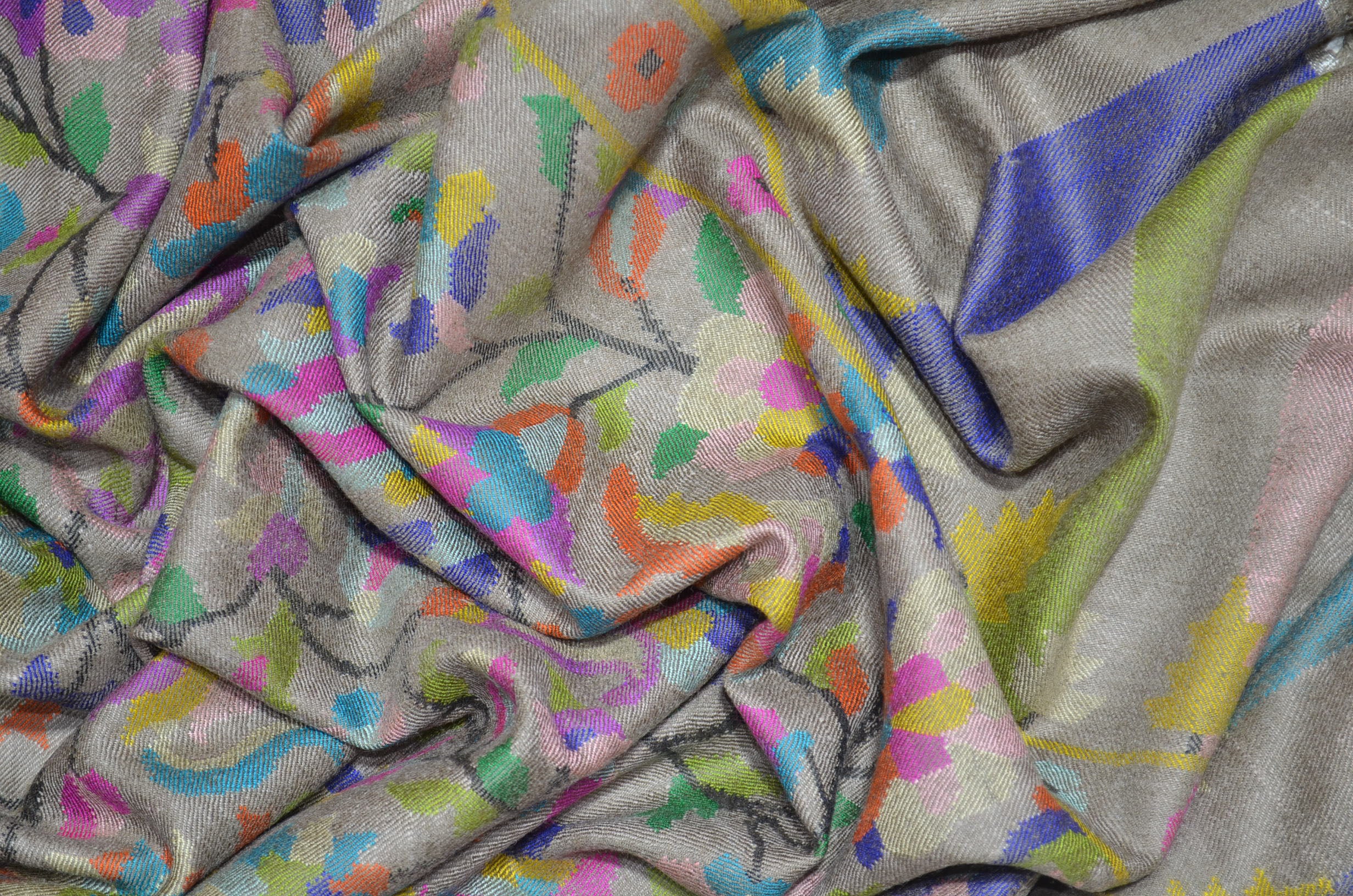 A luxurious Cashmere Pashmina jamawar kani shawl made from highest quality fibers. This kani shawl is a signature of royality. Buy and feel the softness and warmth of this pashmina kani shawl. Hand embroidered in Kashmir | purekashmir.com