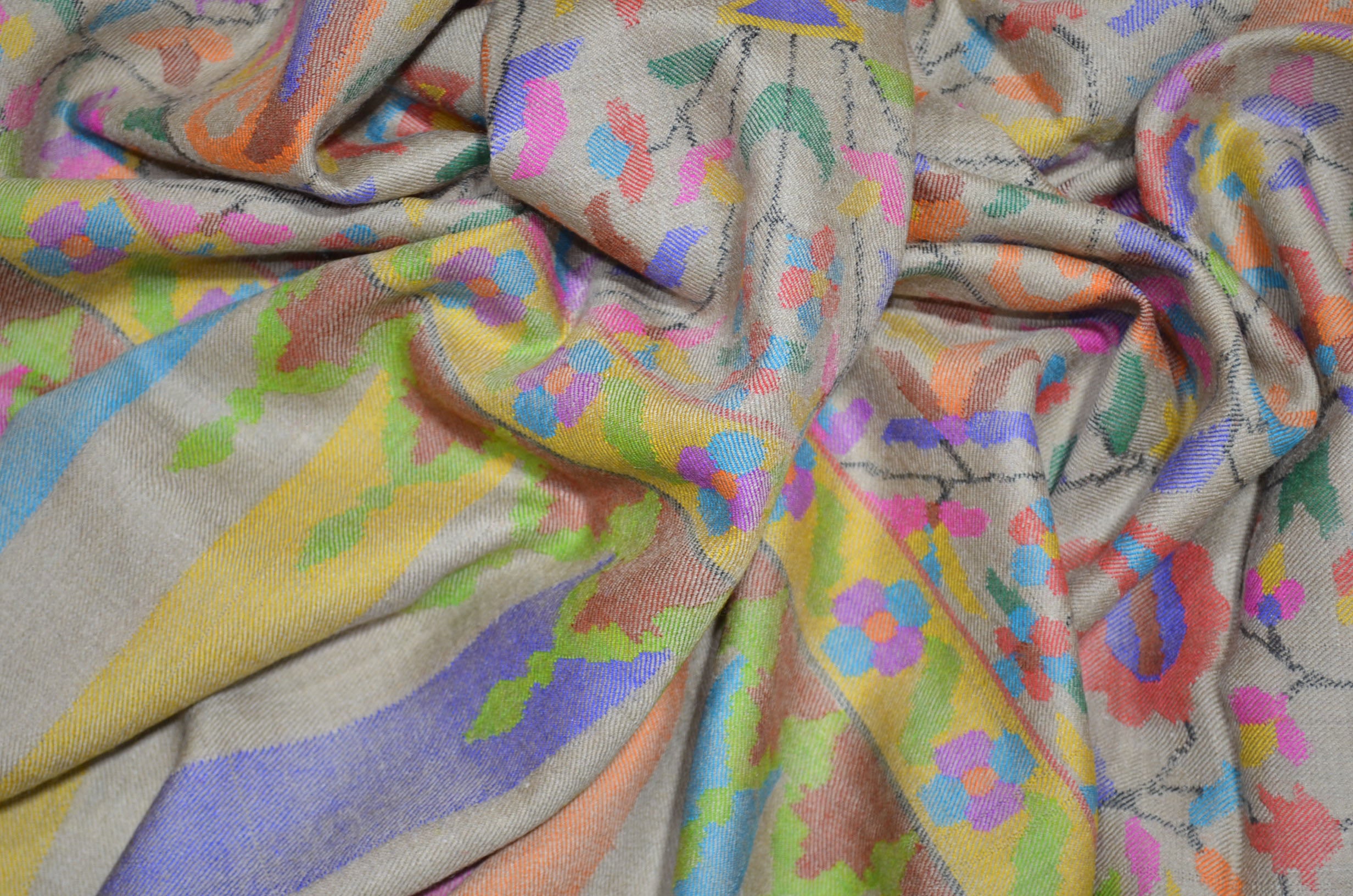 A luxurious Cashmere Pashmina jamawar kani shawl made from highest quality fibers. This kani shawl is a signature of royality. Buy and feel the softness and warmth of this pashmina kani shawl. Hand embroidered in Kashmir | purekashmir.com