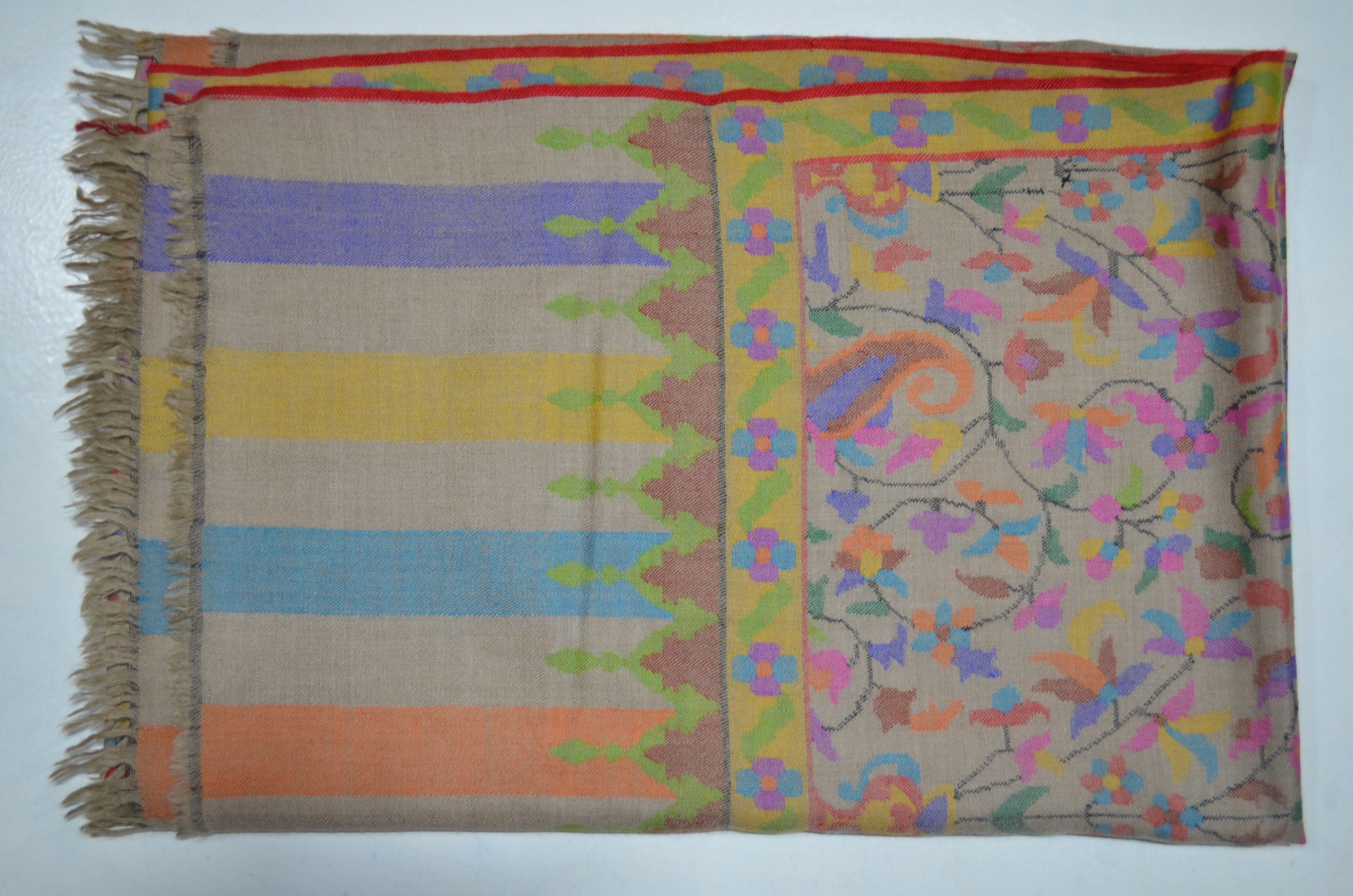 A luxurious Cashmere Pashmina jamawar kani shawl made from highest quality fibers. This kani shawl is a signature of royality. Buy and feel the softness and warmth of this pashmina kani shawl. Hand embroidered in Kashmir | purekashmir.com