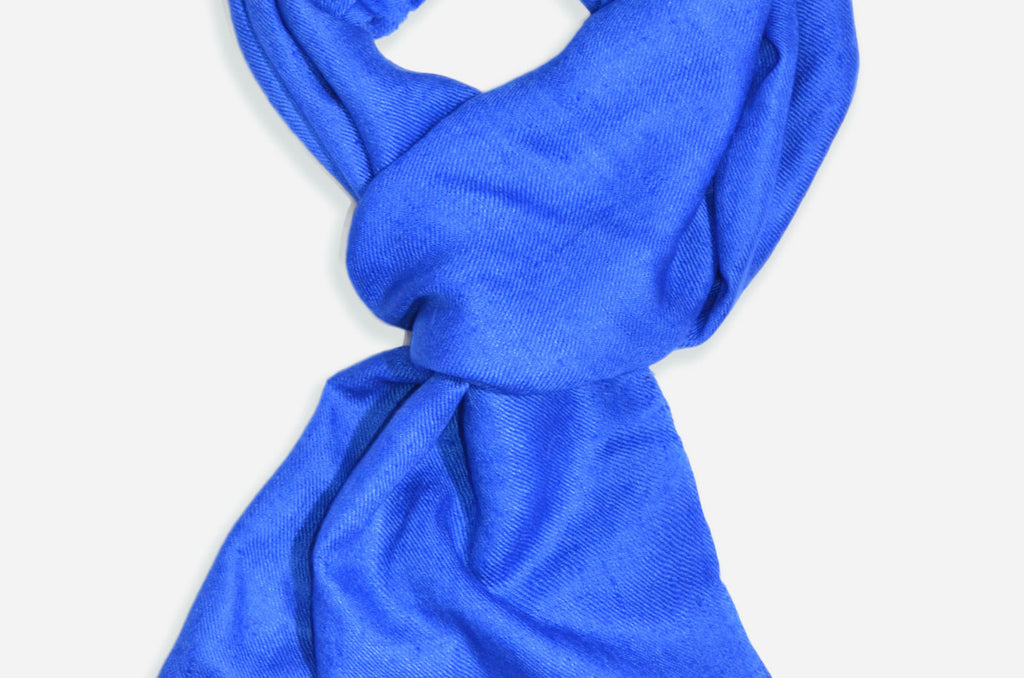 Beautifully light and scrumptiously soft "Royal Blue" Cashmere Scarf is hand woven from the highest grade of 100% pure Cashmere from Kashmir.
