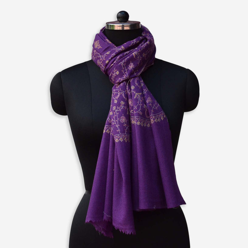 purple jali merino wool embroidery scarf on a mannequin