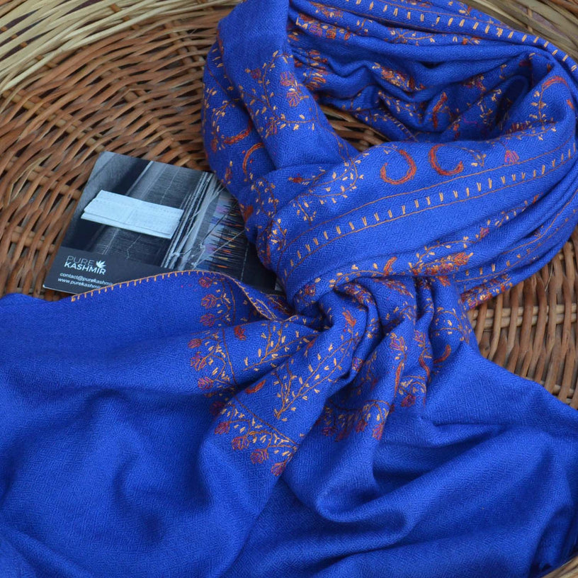 Made from 100% natural fibers this Indigo kashmiri woolen scarf is perfect for your classic look in the cozy winters