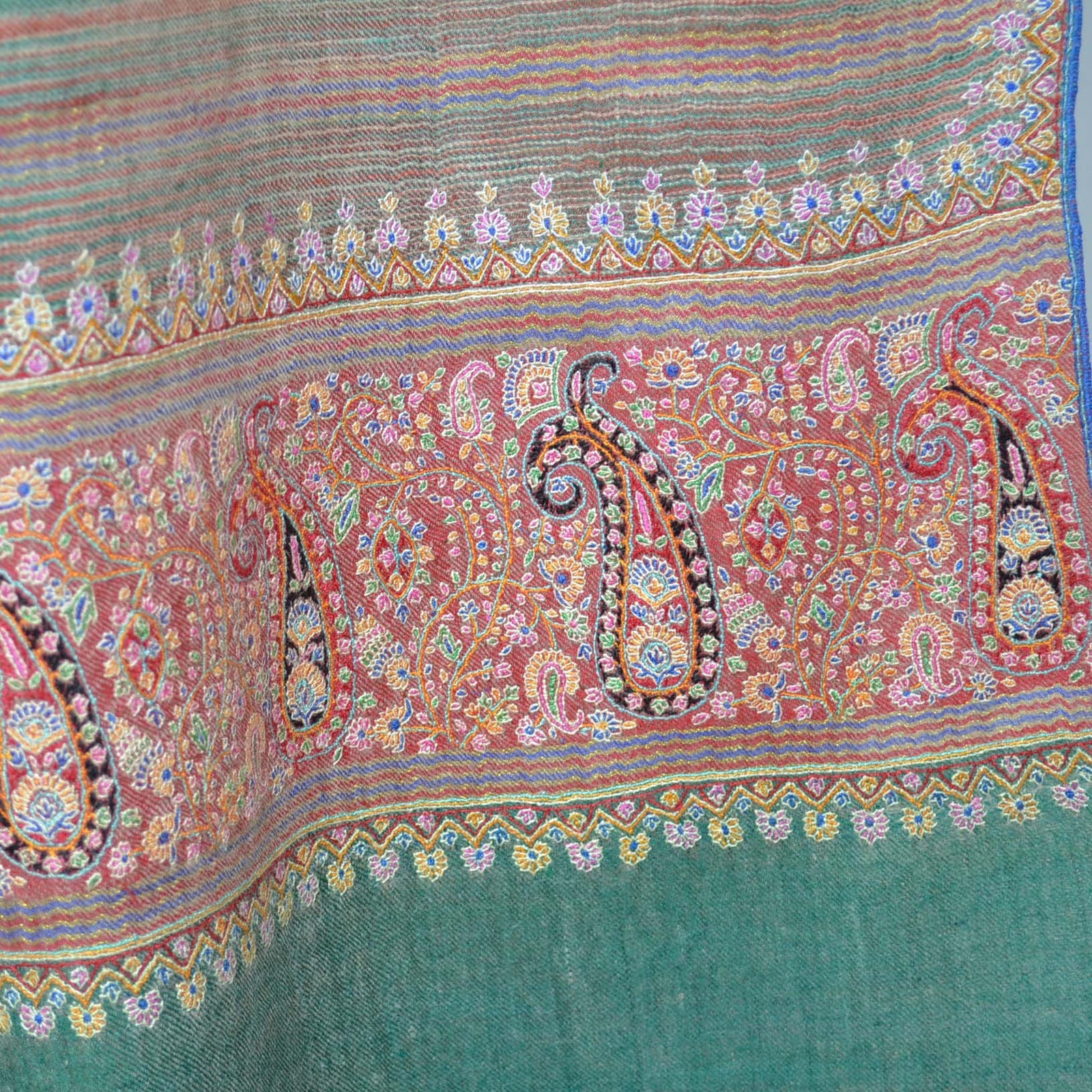 Green Ikat pattern pashmina shawl with border embroidery