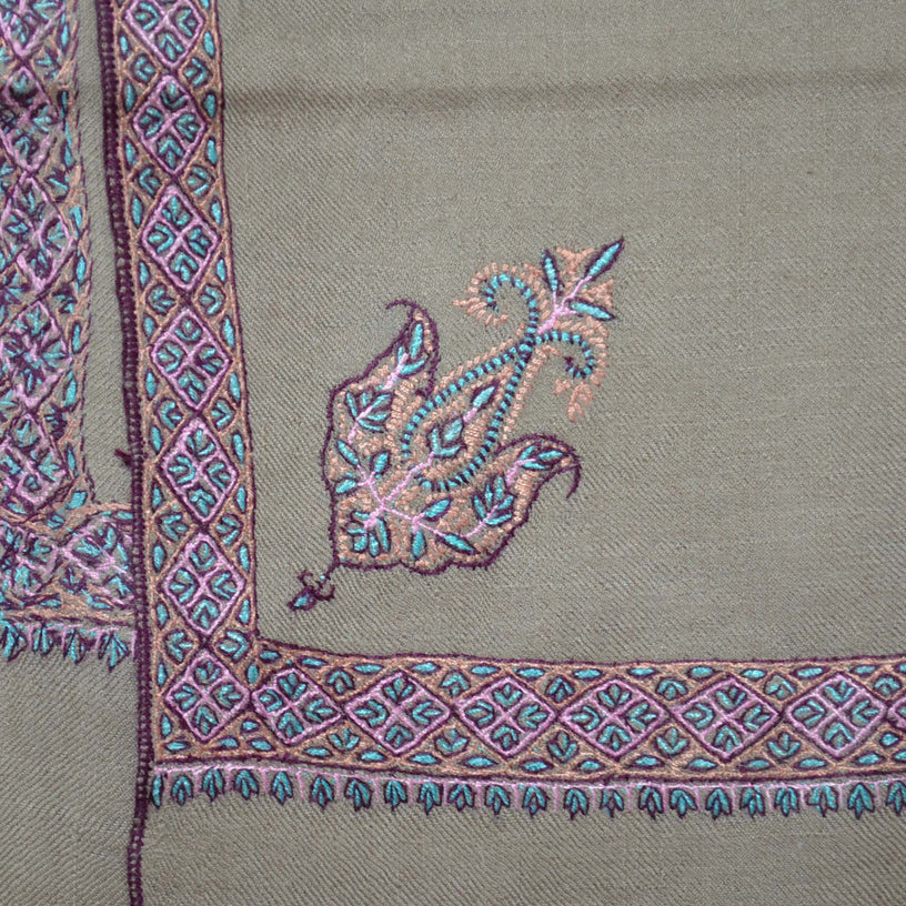 travel wrap with amazing border embroidery on natural base