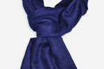 Dark navy cashmere shawl draped, showing the depth of colour and fine weave